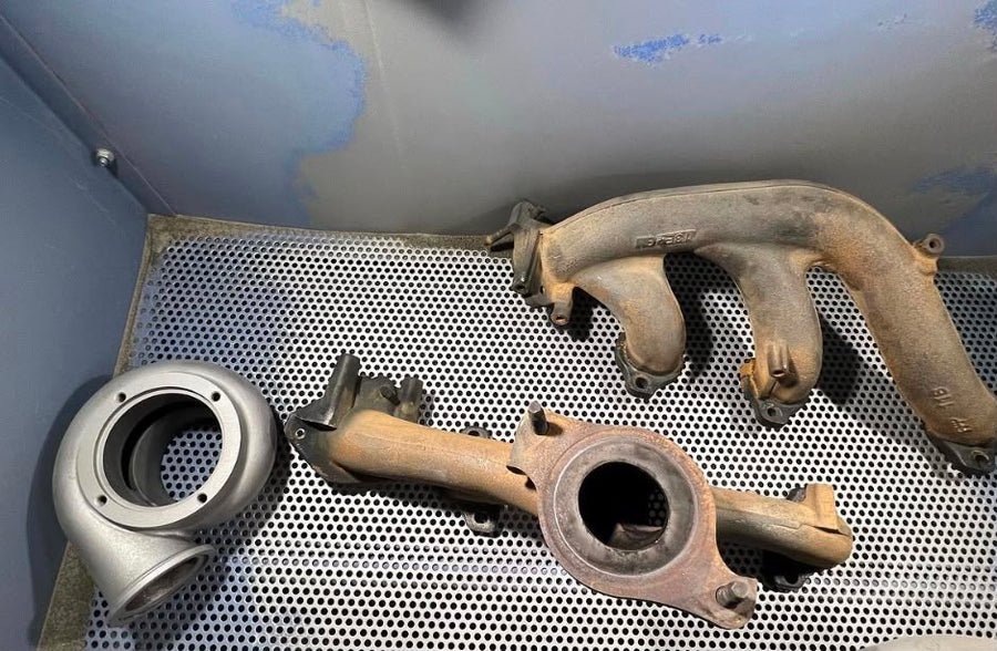 Before — Exhaust manifolds — before & after AlumiKote